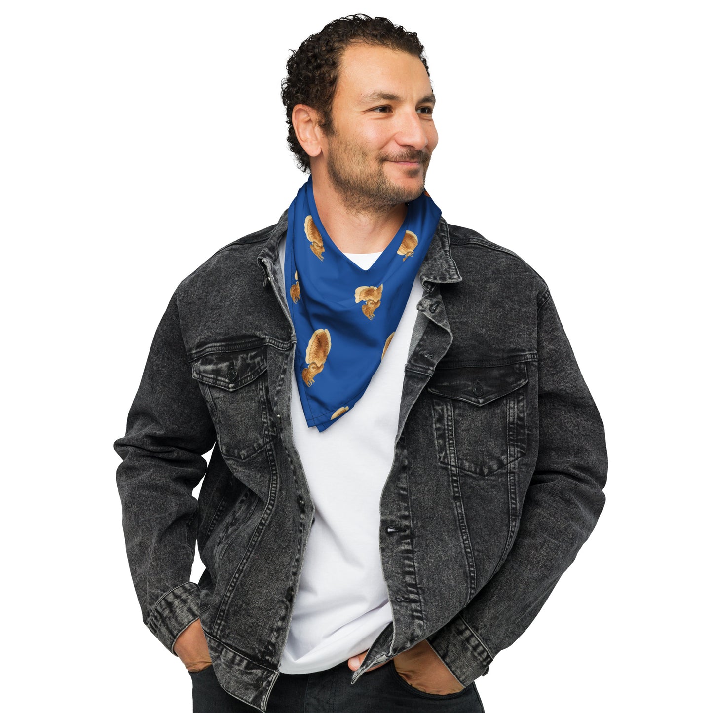 A person wearing a blue bandana with a cuttlefish print, paired with a denim jacket and a white shirt.