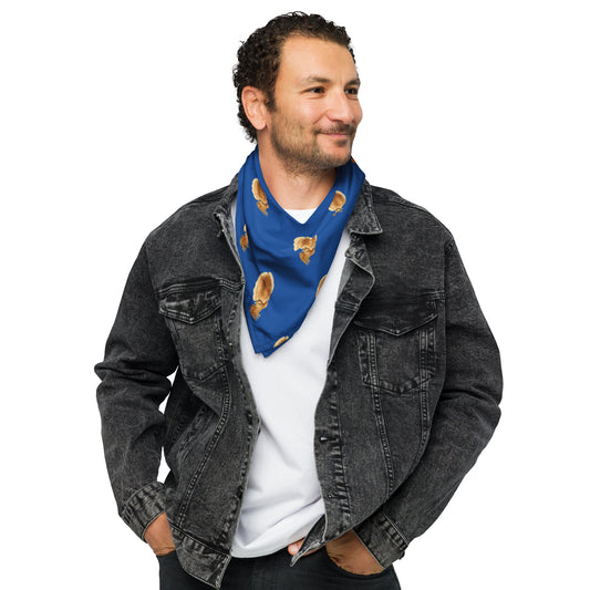 A person wearing a blue bandana with a cuttlefish print, paired with a denim jacket and a white shirt.