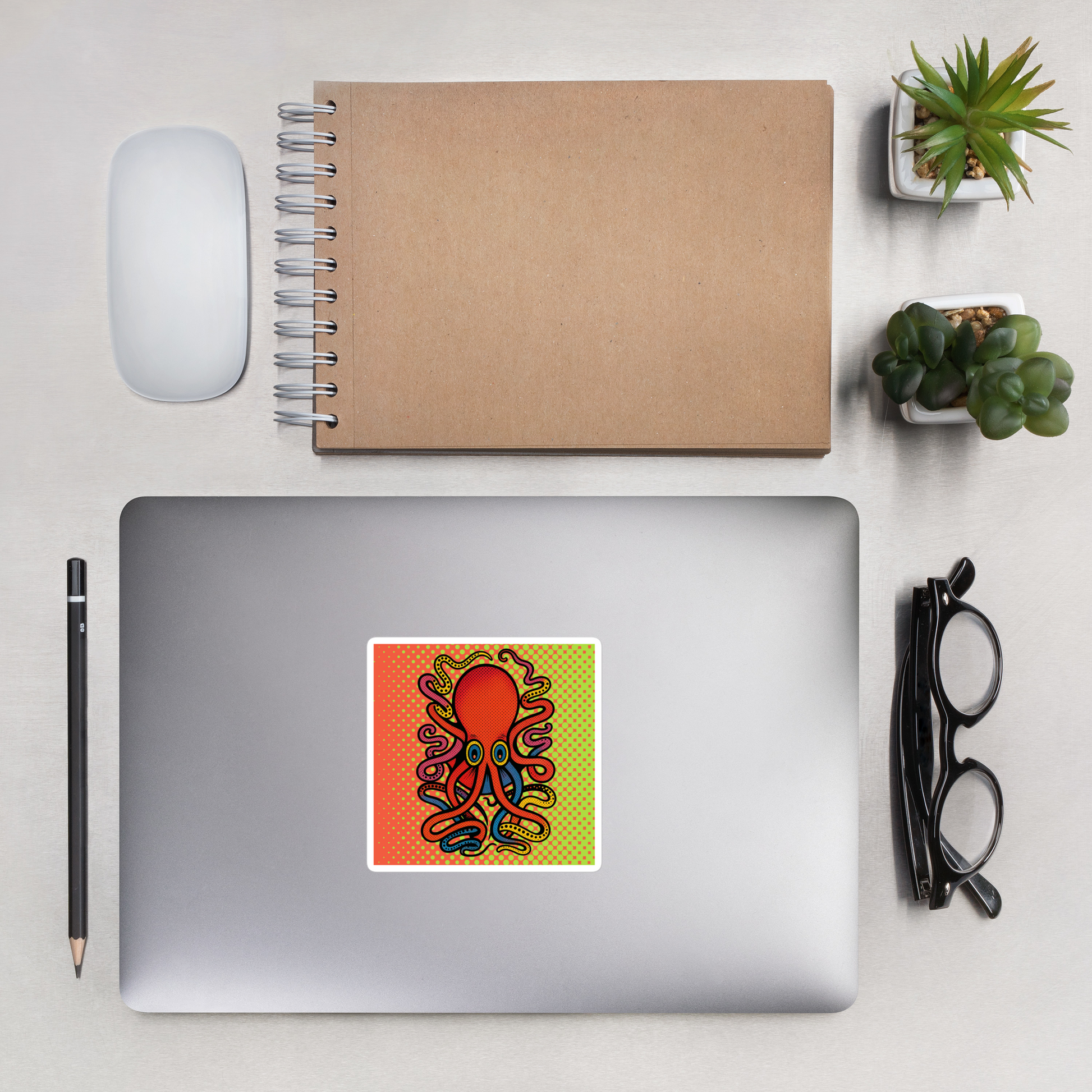 Laptop with an 8 Armed Cuttlefish pop art vinyl sticker 4x4 — red, blue, and orange cuttlefish on halftone background