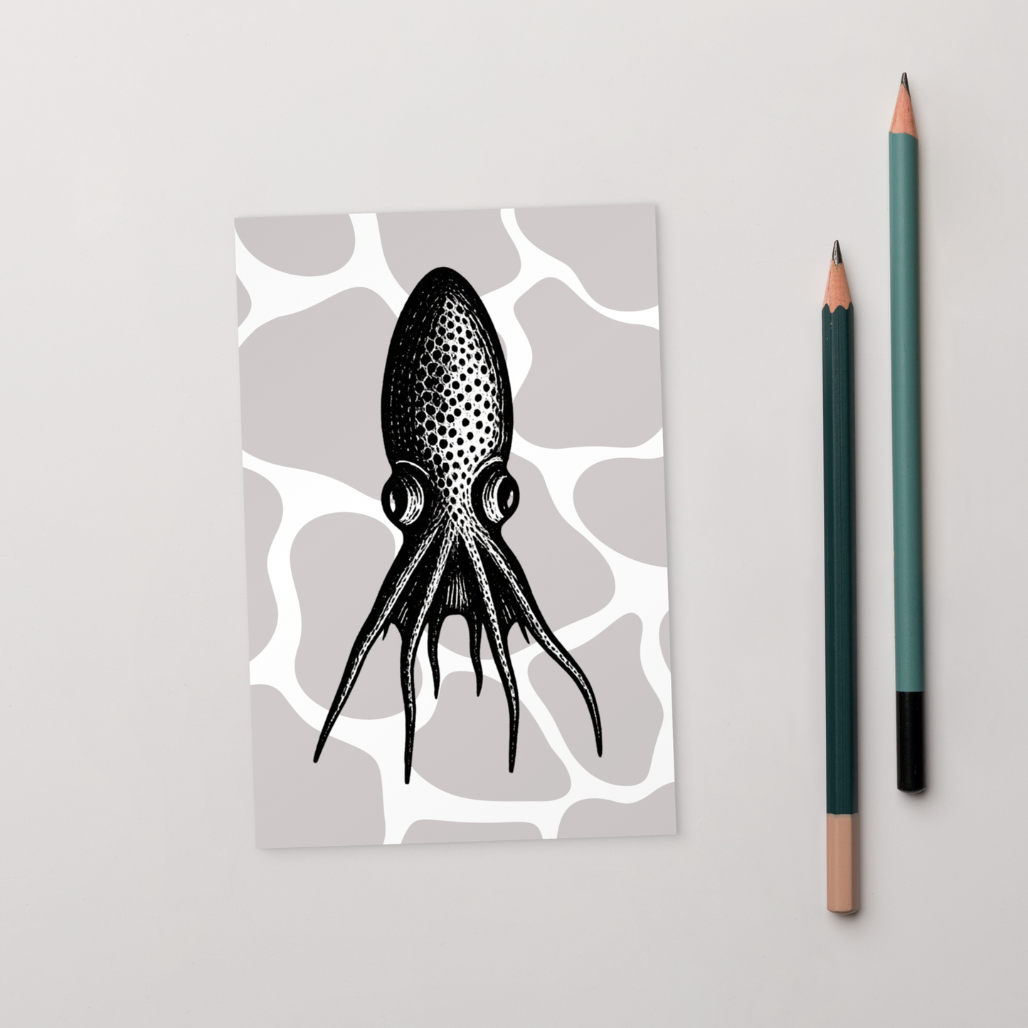 Blanket Octopus vintage illustration postcard — black and white illustration of Tremoctopus on a patterned background with two pencils on a light gray background