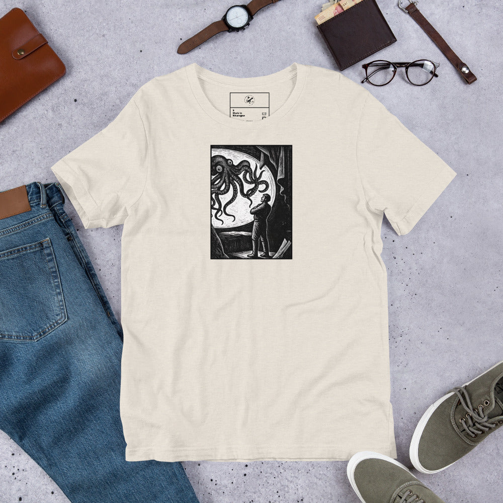 20,000 Leagues Under the Sea vintage lithographic illustration t-shirt — giant squid scene on dark unisex Bella Canvas tee