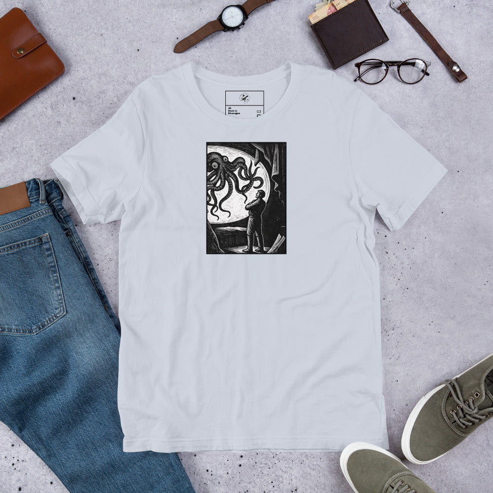 20,000 Leagues Under the Sea vintage lithographic illustration t-shirt — giant squid scene on dark unisex Bella Canvas teeProduct mockup