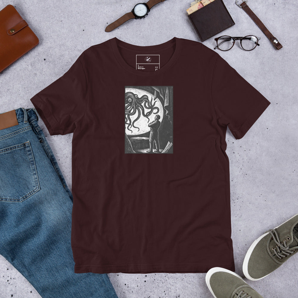 20,000 Leagues Under the Sea vintage lithographic illustration t-shirt — giant squid scene on dark unisex Bella Canvas tee